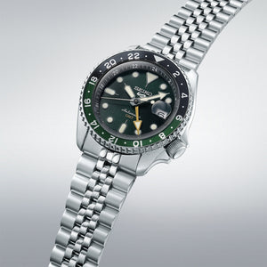 seiko 5 sports skx gmt black & green bezel with a green dial