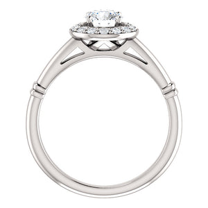 Stunning Halo Style Diamond and Platinum Engagement Ring by Moores
