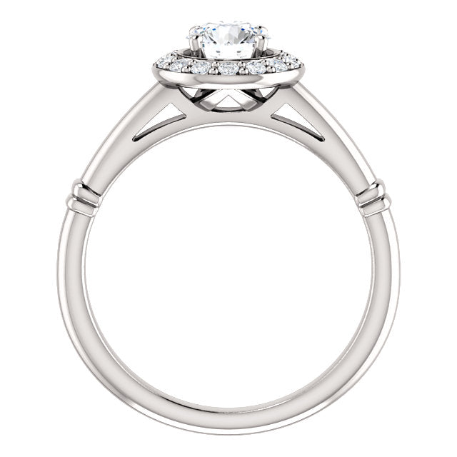 Stunning Halo Style Diamond and Platinum Engagement Ring by Moores