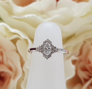 Bespoke Platinum & Diamond Marquise Shaped Halo Engagement Ring by Moores