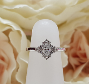 Bespoke Platinum & Diamond Marquise Shaped Halo Engagement Ring by Moores