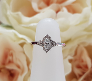 Bespoke Platinum & Diamond Marquise Shaped Halo Engagement Ring by Moores